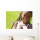 Little Girl Holding Weeds Wall Mural