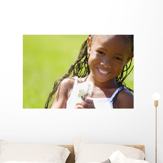 Little Girl Holding Weeds Wall Mural