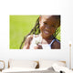 Little Girl Holding Weeds Wall Mural