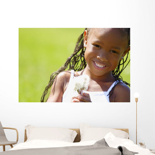 Little Girl Holding Weeds Wall Mural