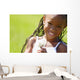 Little Girl Holding Weeds Wall Mural