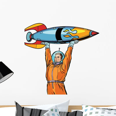Astronaut and Vintage Rocket Wall Decal shown on a wall