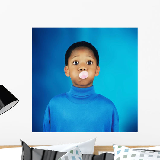 A Boy Blowing A Bubble Wall Mural