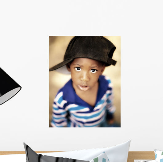 Boy Wearing Over Sized Hat Sideways Wall Mural