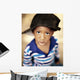 Boy Wearing Over Sized Hat Sideways Wall Mural