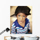 Boy Wearing Over Sized Hat Sideways Wall Mural