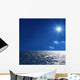 a background image of an open sea and blue sky Wall Mural