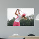 golf swing at finish lady Wall Mural