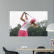 golf swing at finish lady Wall Mural