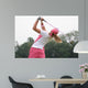 golf swing at finish lady Wall Mural