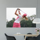 golf swing at finish lady Wall Mural