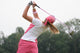 golf swing at finish lady Wall Mural