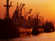 Shipping Freighters At Sunset Wall Mural