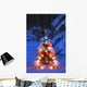 Illuminated Christmas Tree In A Forest Wall Mural