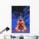 Illuminated Christmas Tree In A Forest Wall Mural