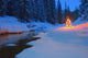Glowing Christmas Tree By Mountain Stream Wall Mural