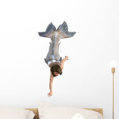 Swimming Silver Tailed Mermaid Wall Decal shown on a wall
