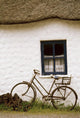 Tahtched Cottage And Bike Wall Mural