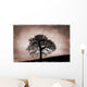 Tree Against A Stormy Sky Wall Mural