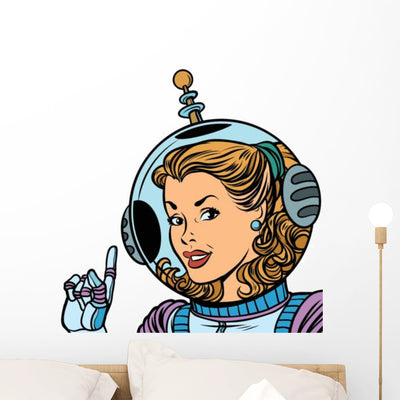 Girl Astronaut White Wall Decal shown on a wall