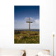 Grave Site Marked By A Cross On A Hill Wall Mural