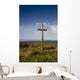 Grave Site Marked By A Cross On A Hill Wall Mural