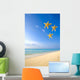 Starfish Falling In Front Of The Ocean Wall Mural