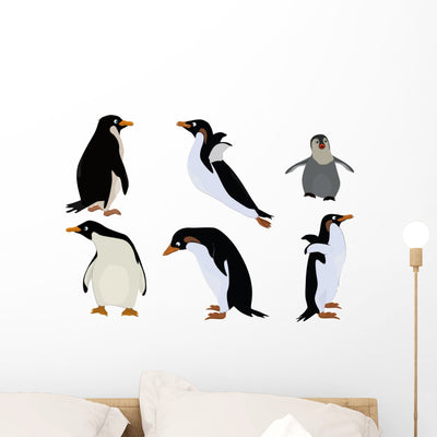 Wallmonkeys Winter Penguins Wall Decal Sticker Set shown on a wall