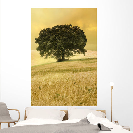 wheat field with majestic tree Wall Mural
