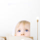 Child Looking Up Wall Mural