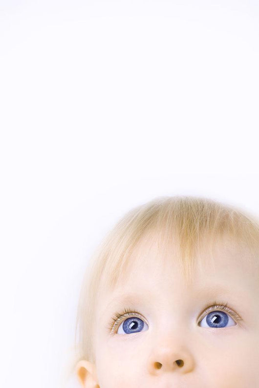 Child Looking Up Wall Mural