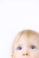 Child Looking Up Wall Mural