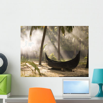 Sunlight Shining Canoe Wall Mural shown on a wall