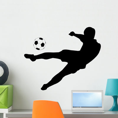 Soccer Silhouettes Wall Decal shown on a wall