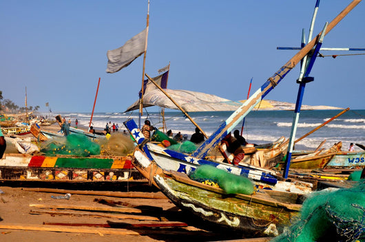 Fishing boats on beach Ghana Wall Mural