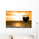 Glass of wine on the beach Wall Mural