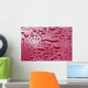 Liquid Drops On Red Surface Wall Mural