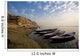 Boats Moored On River In A Row Outside City Wall Mural