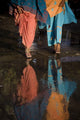 Reflections In Water Of Women Walking Wall Mural