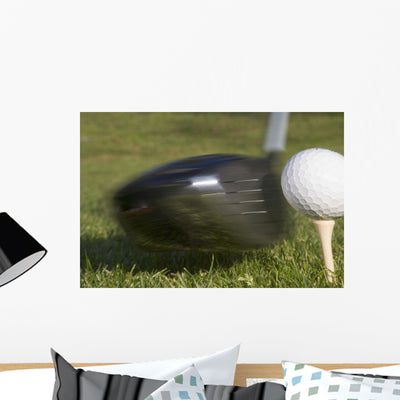 Golf Ball Tee Hit Wall Mural shown on a wall