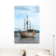 Pirate style ship setting sail on the high seas Wall Mural