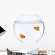 Two goldfish swimming in fish bowl in front of white background Wall Decal