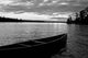 Abandoned Canoe Floating On Water Wall Mural