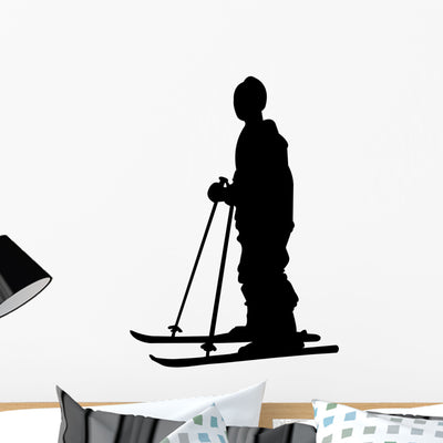 Skiing Silhouette Wall Decal shown on a wall