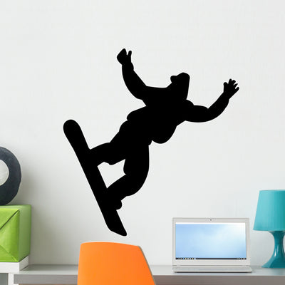 Skiing Silhouette Wall Decal shown on a wall