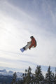Man Snowboarding, Jumping In Mid-Air Wall Mural