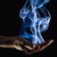Smoke Wisps From A Hand Wall Mural