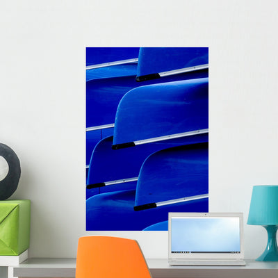 Blue Canoes Wall Mural shown on a wall