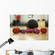 Dumbbells and ball on the floor of a fitness room Wall Mural