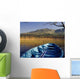 Row Boat Amongst Reeds On A Lake Wall Mural